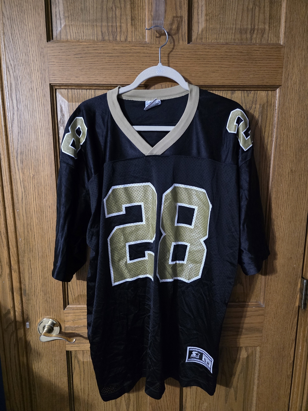 STARTER Black Jersey with Gold Number 28